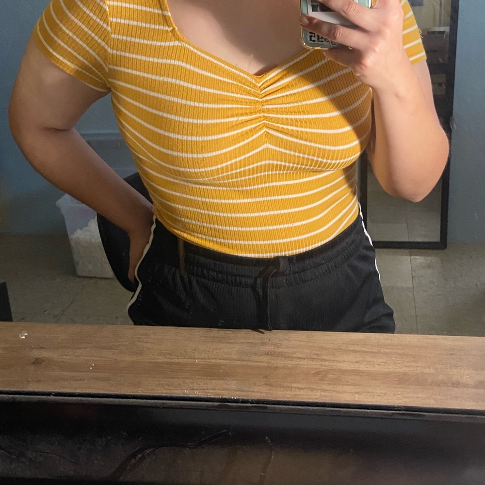 Yellow body suit